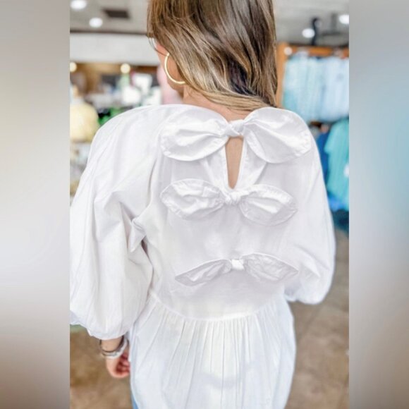 Boutique Tops - Boutique Quarter sleeve cotton | 3 knotted Bow Peplum top size M
